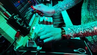 a person is playing a keyboard